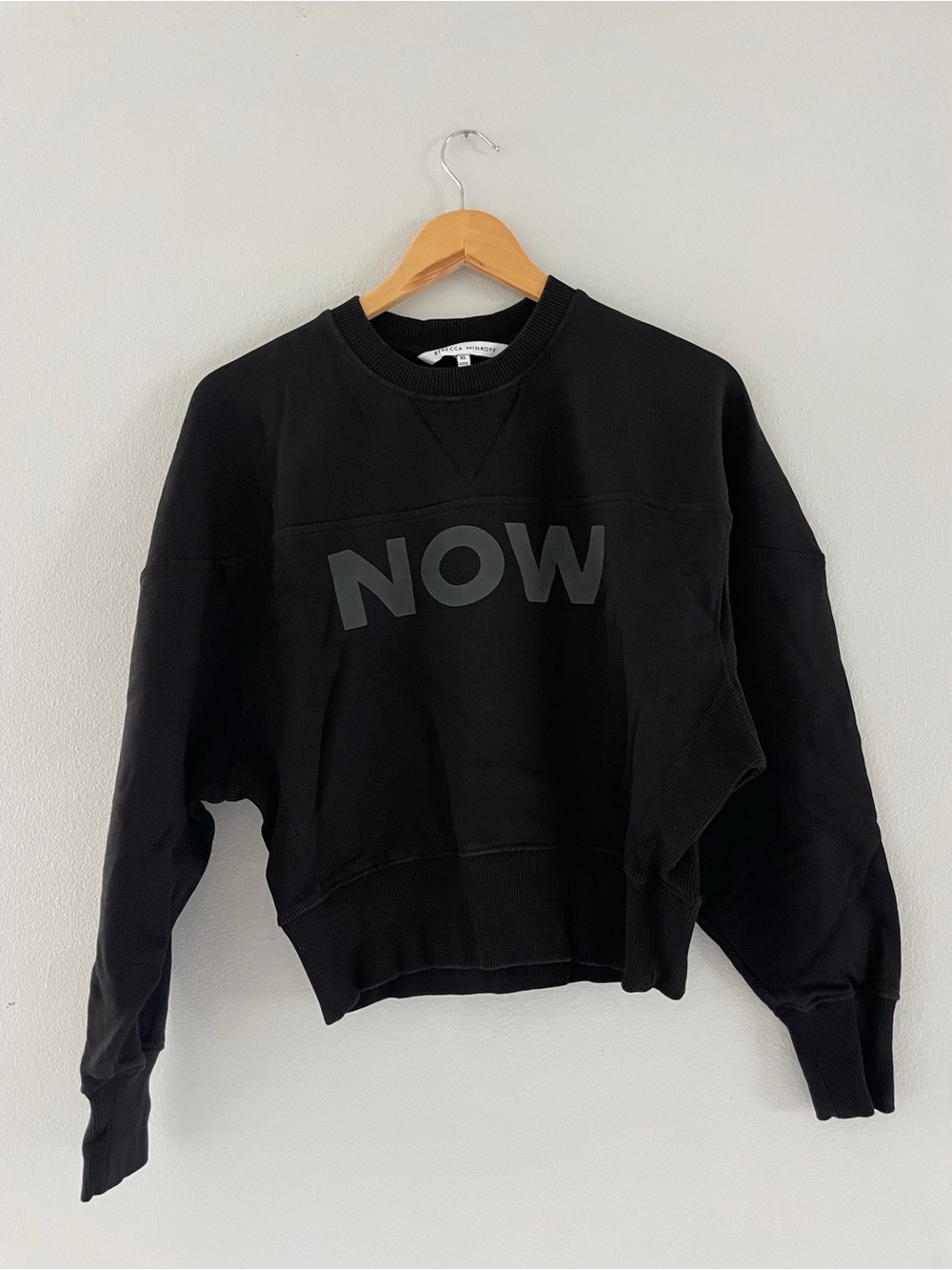 Rebecca Minkoff Black Cropped Crewneck Sweatshirt with 'NOW' Graphic